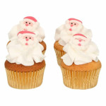 Christmas cupcakes decorated with sugar Santa Claus