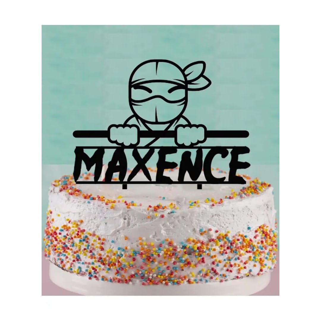 ninja cake topper on a cake