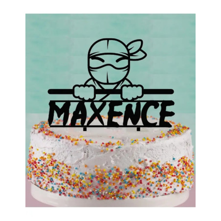 ninja cake topper on a cake