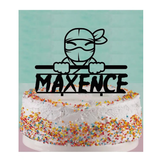 ninja cake topper on a cake