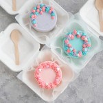 several bento cakes in their boxes