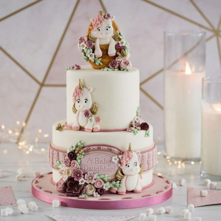 cake design decorated with unicorns