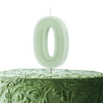 pastel green number candle 0 on cake
