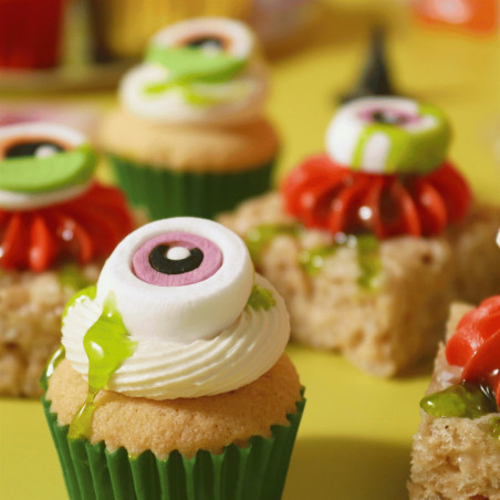 cupcake decorated with the pme slime kit