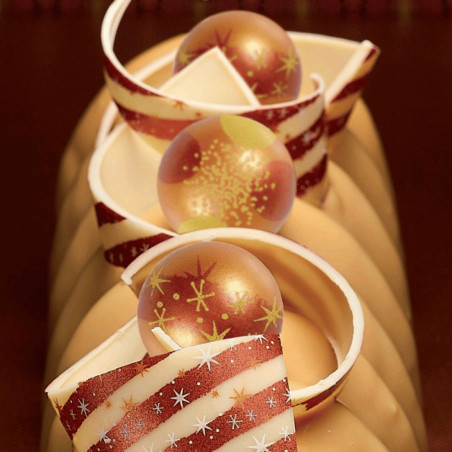 Christmas log decorated with chocolate boule
