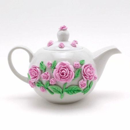pink modeling on teapot
