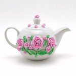 pink modeling on teapot