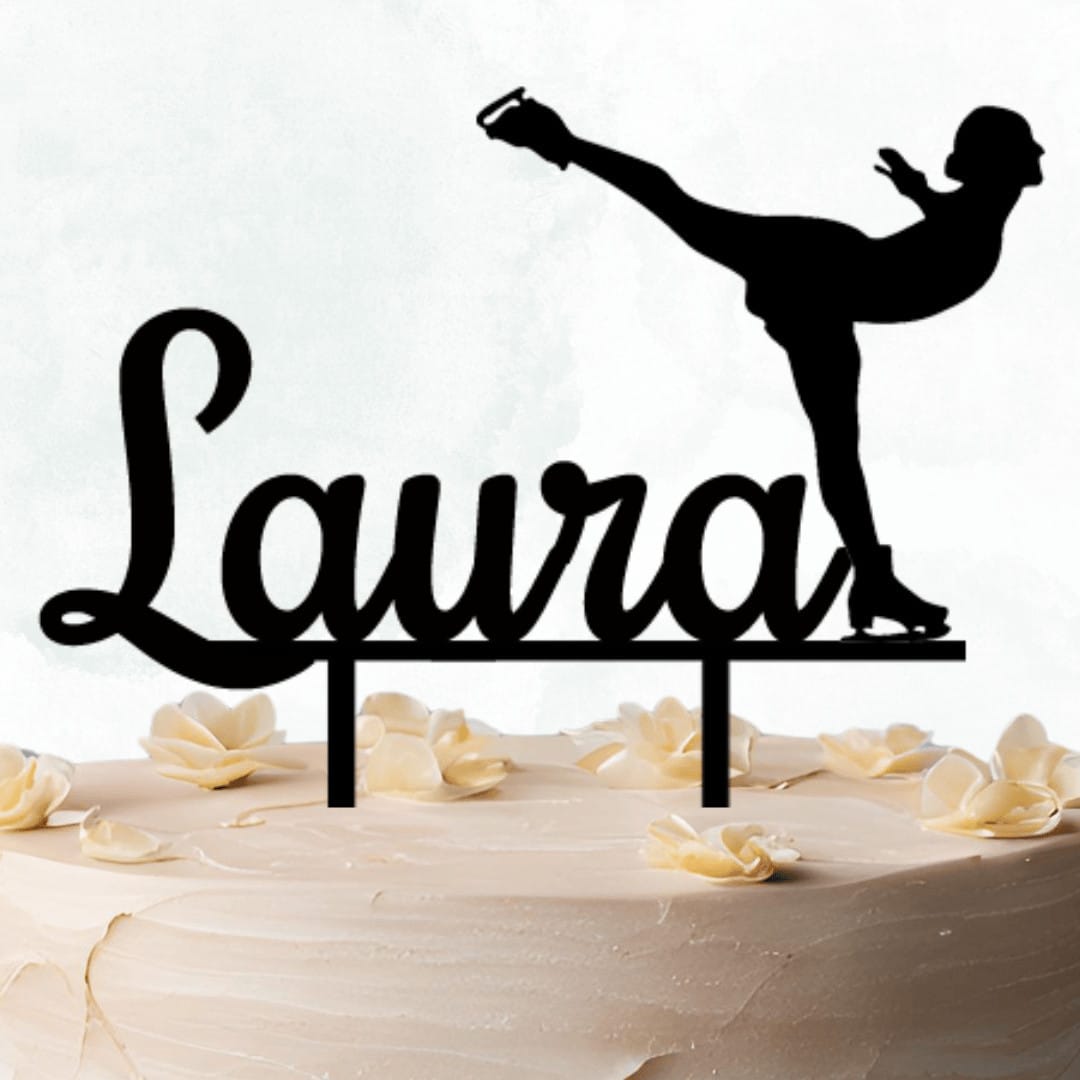 Figure skater cake topper on cake