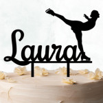 Figure skater cake topper on cake