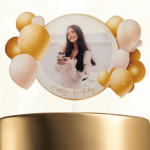 Golden birthday balloon cake topper on cake design