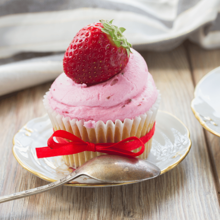 buttercream on strawberry cupcake