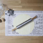 Non-stick graduated baking mat suitable for pie crusts, biscuits, cakes