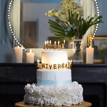 Golden “happy birthday” candles