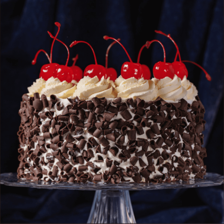 Black Forest cake decoration with maraschino cherries