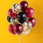 gold confetti balloons for a balloon arch