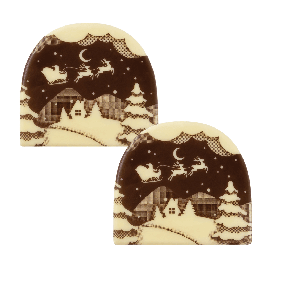 2 chocolate log ends shaped like Santa's sleigh